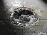 Laundry Drain Backups: How Lint and Detergent Clog Pipes